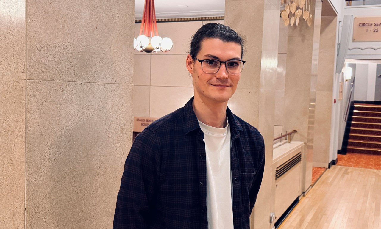 A promotional photograph of Rob Hughes at Liverpool Philharmonic Hall